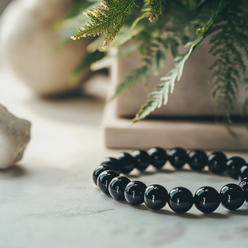 files/u5484484689_black_obsidian_crystal_bracelet_with_round_beads__4169f100-f451-4c4c-b659-ba6c291f5d87_0.png